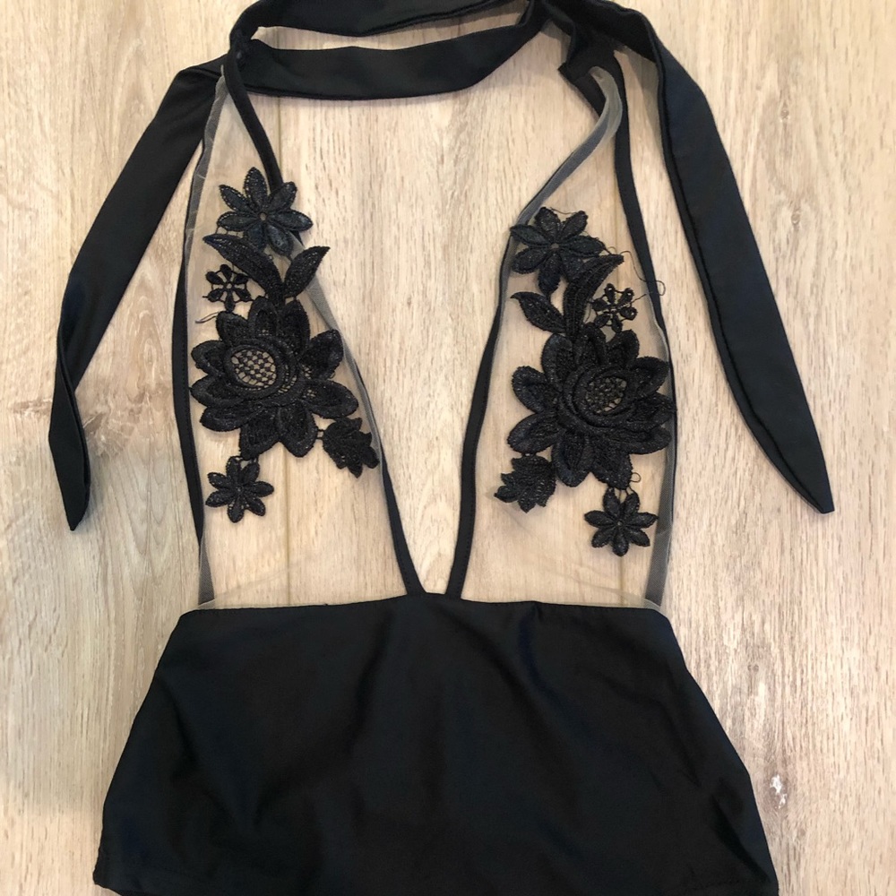 Bathing suit/body suit..